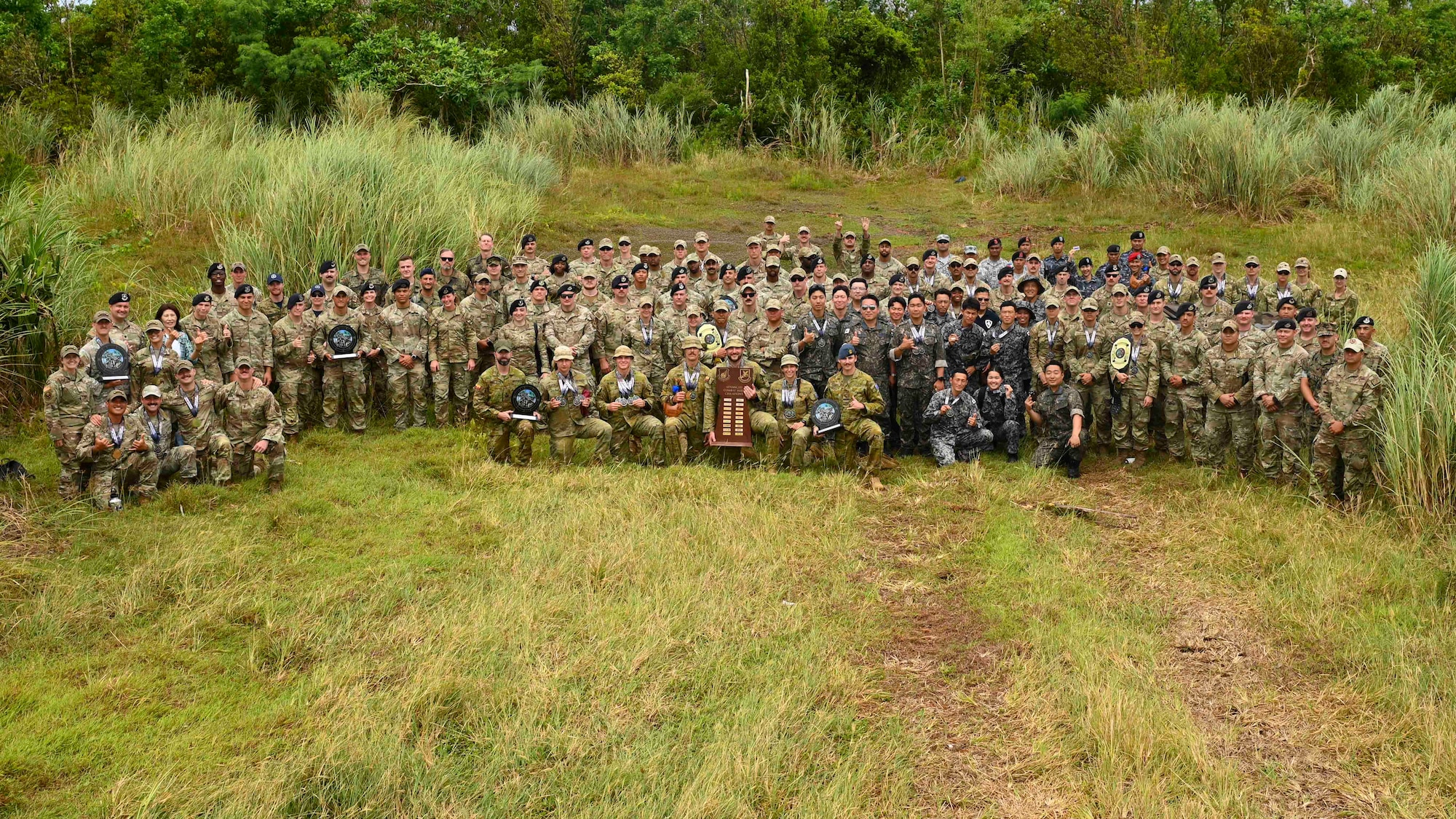 Participants from ACSA pose together after the closing ceremony.