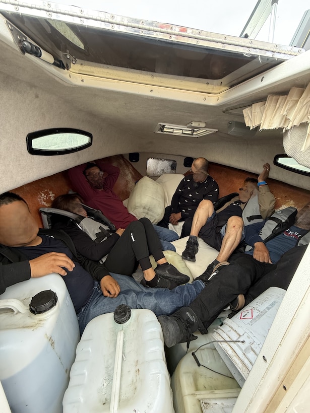 Six suspected aliens are pictured in the forepeak of a 20-foot cuddy cabin during a boarding of the vessel approximately 27 miles east of San Clemente Island, California, May 22, 2026. A Coast Guard boarding team assigned to the 87-foot Marine Protector-class U.S. Coast Guard Cutter Haddock (WPB 87347) identified 10 suspected aliens during the boarding and transferred custody of all 10 to U.S. Border Patrol agents at Ballast Point. (U.S. Coast Guard courtesy photo)