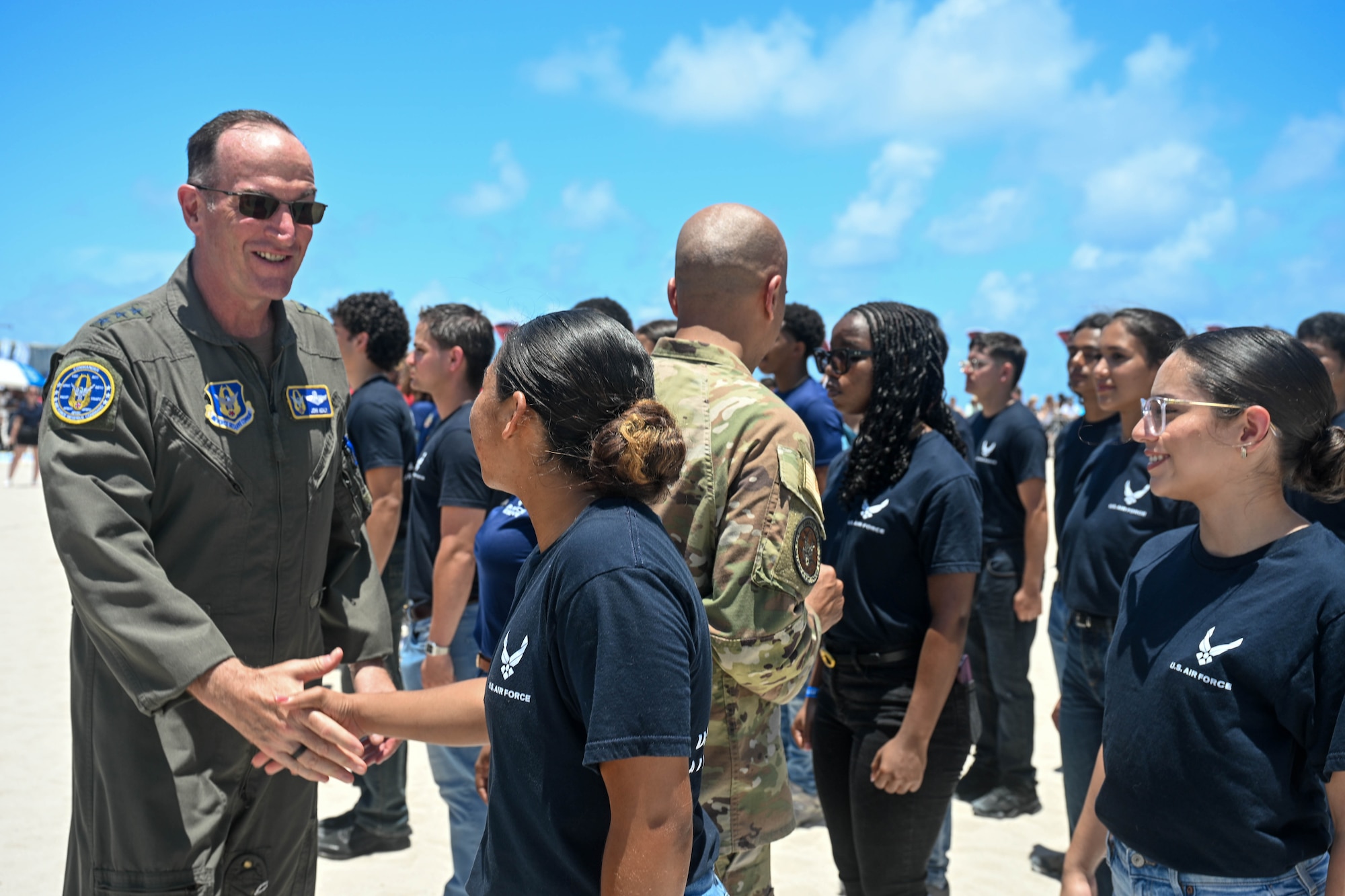 Air Force leaders shake hands of new Airmen