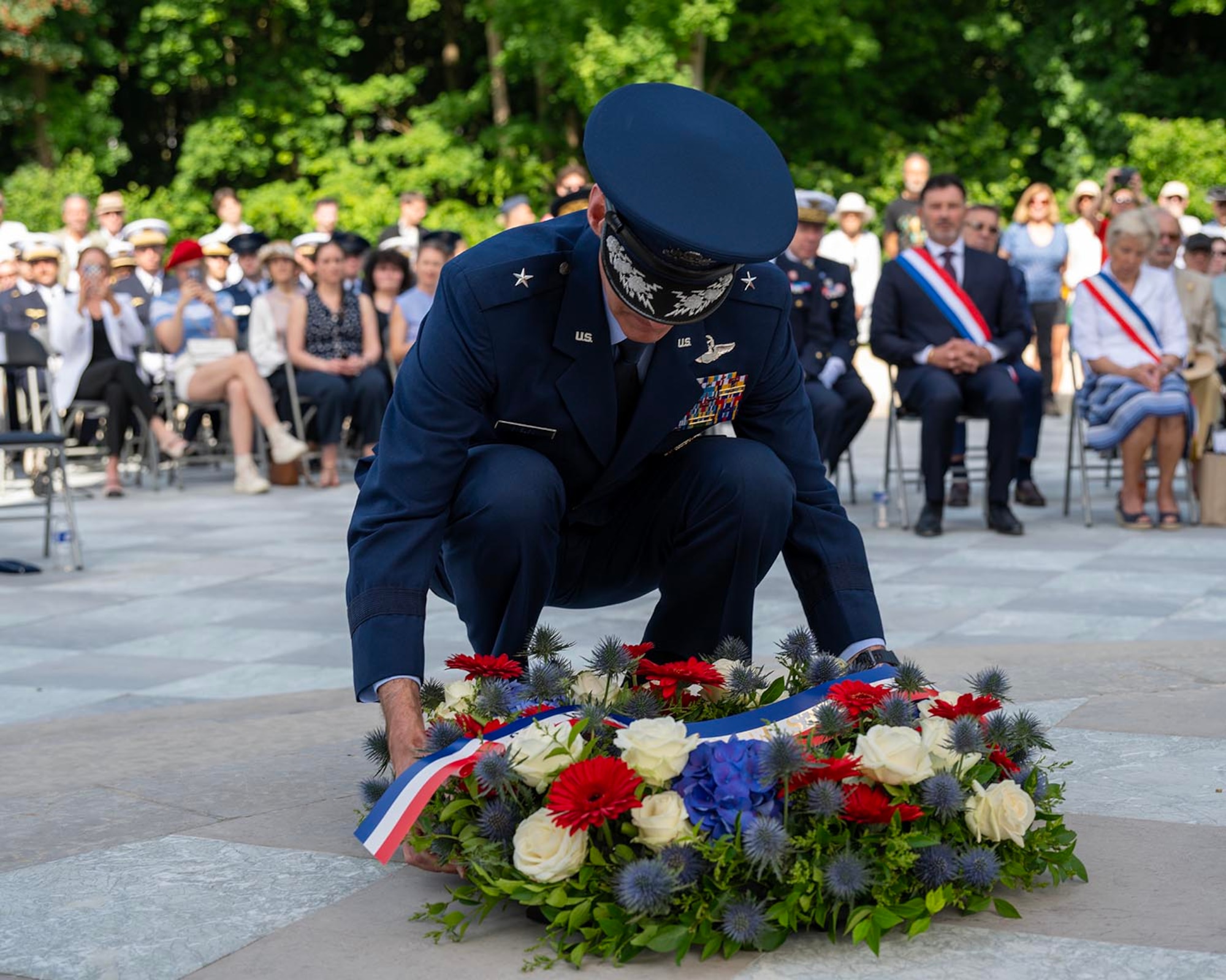 U.S. Air Force Brig. Gen. Stephen P. Snelson, U.S. Air Forces in Europe - Air Forces Africa deputy commander, lays a wreath to pay tribute to fallen American and French service members during a Memorial Day ceremony held at the Lafayette Escadrille Memorial in Marnes-la-Coquette, France, May 24, 2026.