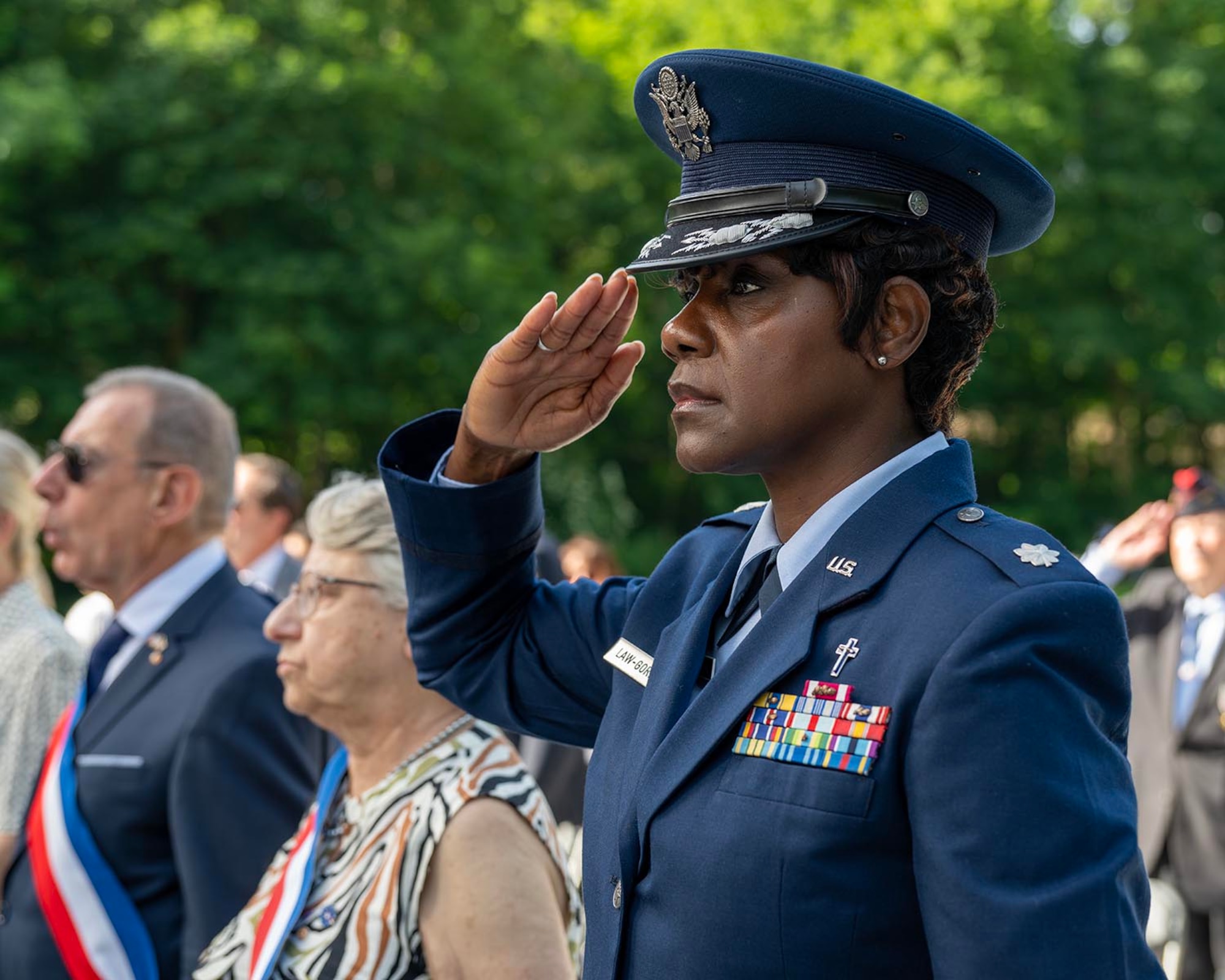 U.S. Air Force Ch, Lt. Col. Michelle Law-Gordon, an individual mobilization augmentee to the U.S. Air Forces in Europe - Air Forces Africa deputy command chaplain, renders a salute during a Memorial Day ceremony held at the Lafayette Escadrille Memorial, Marnes-la-Coquette, France, May 24, 2026.