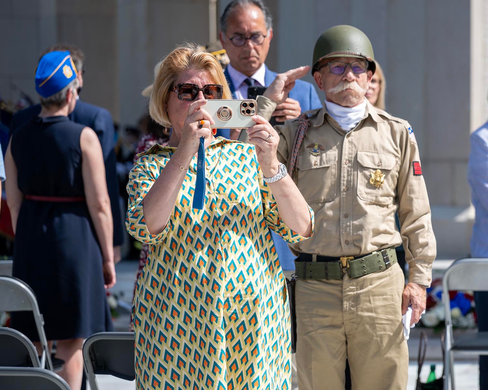 An attendee renders a salute during a Memorial Day ceremony held at the Lafayette Escadrille Memorial, Marnes-la-Coquette, France, May 24, 2026.