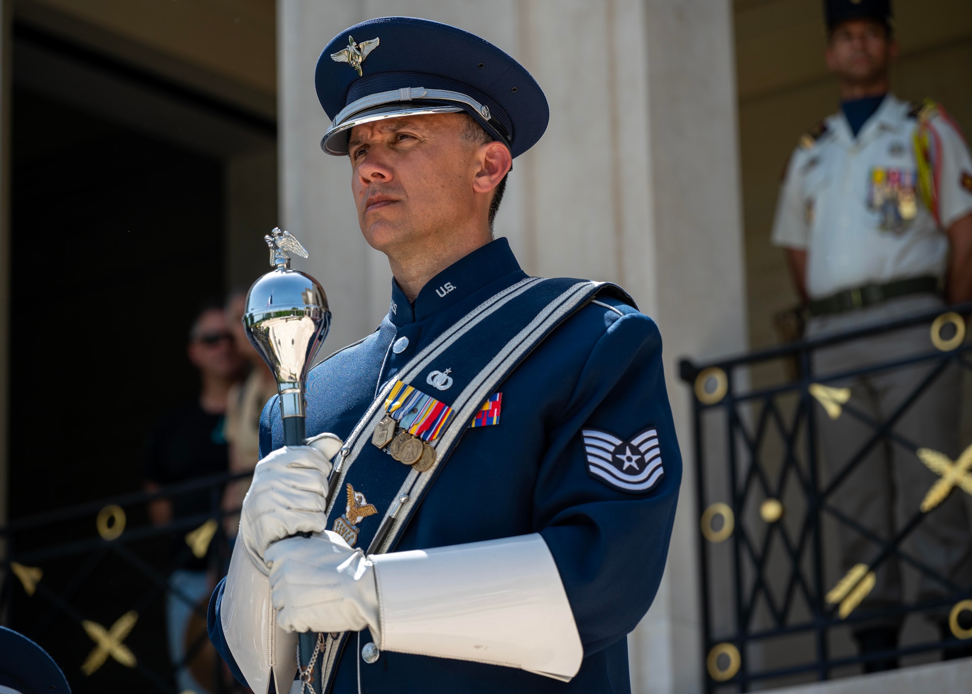 U.S. Air Force Tech. Sgt. Brad Green, U.S. Air Forces in Europe - Air Forces Africa Band drum major, performs during a Memorial Day ceremony held at the Suresnes American Cemetery and Memorial, Suresnes, France, May 24, 2026.