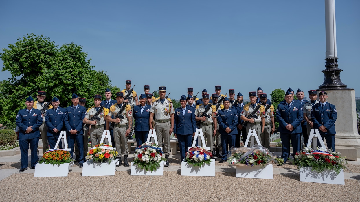 U.S. Air Force Airmen and French Air Force Airmen pose for a photo during a Memorial Day ceremony held at the Suresnes American Cemetery and Memorial, Suresnes, France, May 24, 2026.
