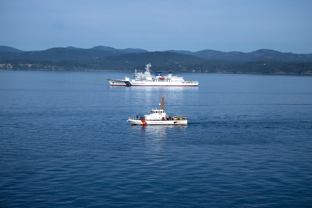 U.S. Coast Guard Cutter Osprey (WPB-87307) and Japan Coast Guard ship Itsukushima transit the Strait of Juan de Fuca during a joint search and rescue exercise, May 21, 2026.