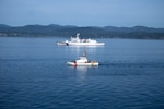U.S. Coast Guard Cutter Osprey (WPB-87307) and Japan Coast Guard ship Itsukushima transit the Strait of Juan de Fuca during a joint search and rescue exercise, May 21, 2026.