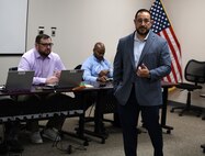 AMLC M3D director talks to medical maintenance operations division leaders during management review session at Hill Air Force Base, Utah.
