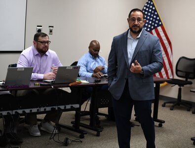 AMLC M3D director talks to medical maintenance operations division leaders during management review session at Hill Air Force Base, Utah.