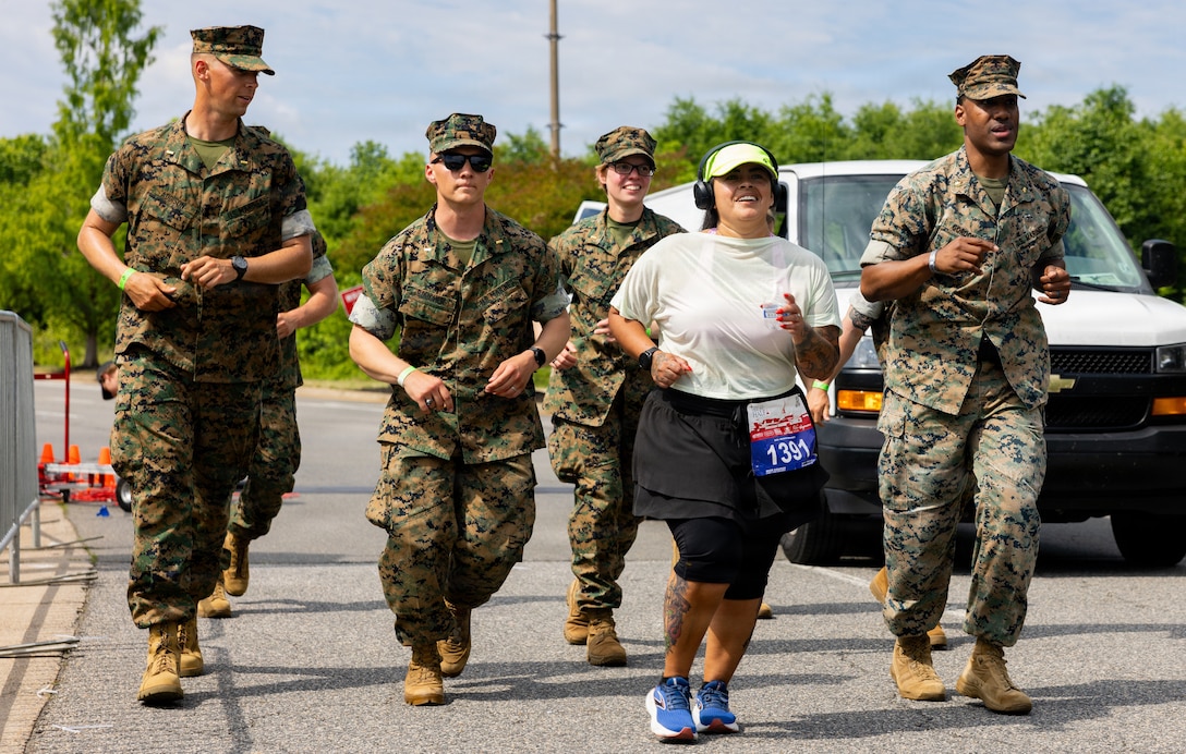 At mile 11, she wanted to quit. Marines made sure she didn’t.