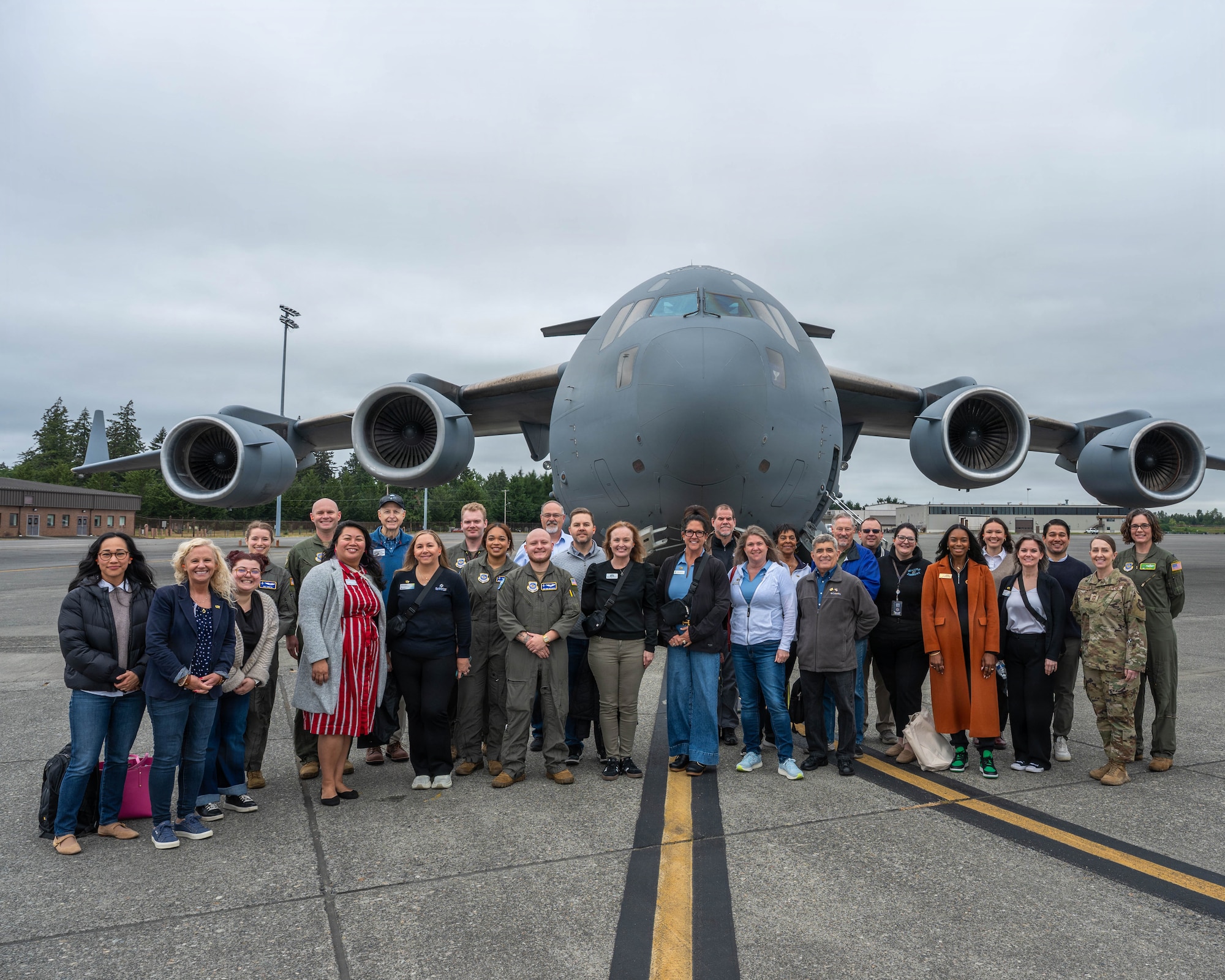 62d Airlift Wing leadership and Airmen, along with civic leaders from the local area, stand together on the McChord flightline at Joint Base Lewis-McChord, Washington, May 19, 2026.