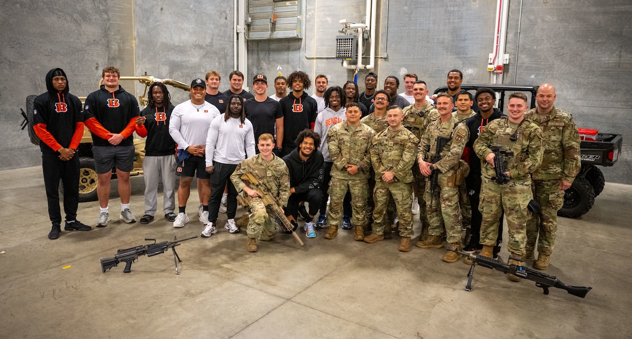 Cincinnati Bengals rookies pose with 88th Security Forces Defenders for a group photo to close out their visit May. 15, 2026 to Wright-Patterson Air Force Base, Ohio. 19 Bengals rookies made the trip to WPAFB for an interaction with Airmen and to learn about what they do. (U.S. Air Force photo by Jack Gardner)