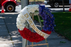 A Memorial Day wreath is placed outside.
