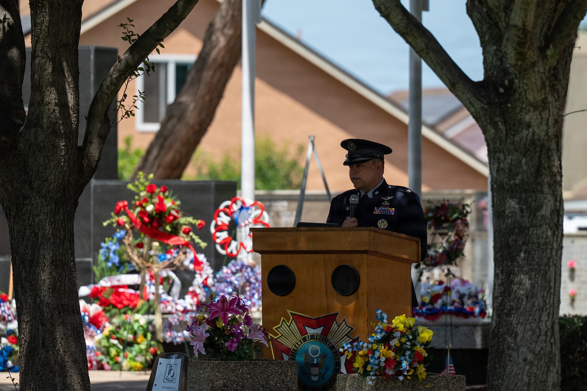 Col. James T. Horne III speaks at a podium.