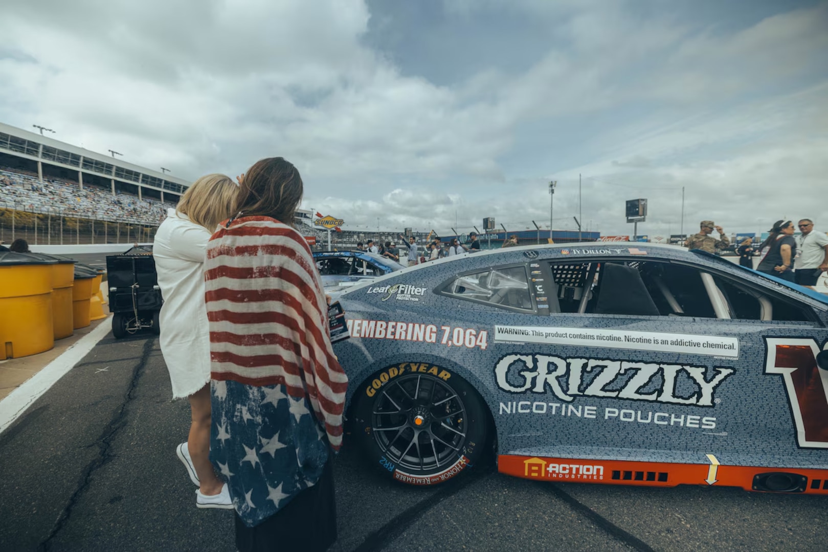 Jane Horton, right, checks out Ty Dillon's No. 10 Chevrolet before the Coca-Cola 600 NASCAR race at Charlotte Motor Speedway in North Carolina, May 24, 2026.