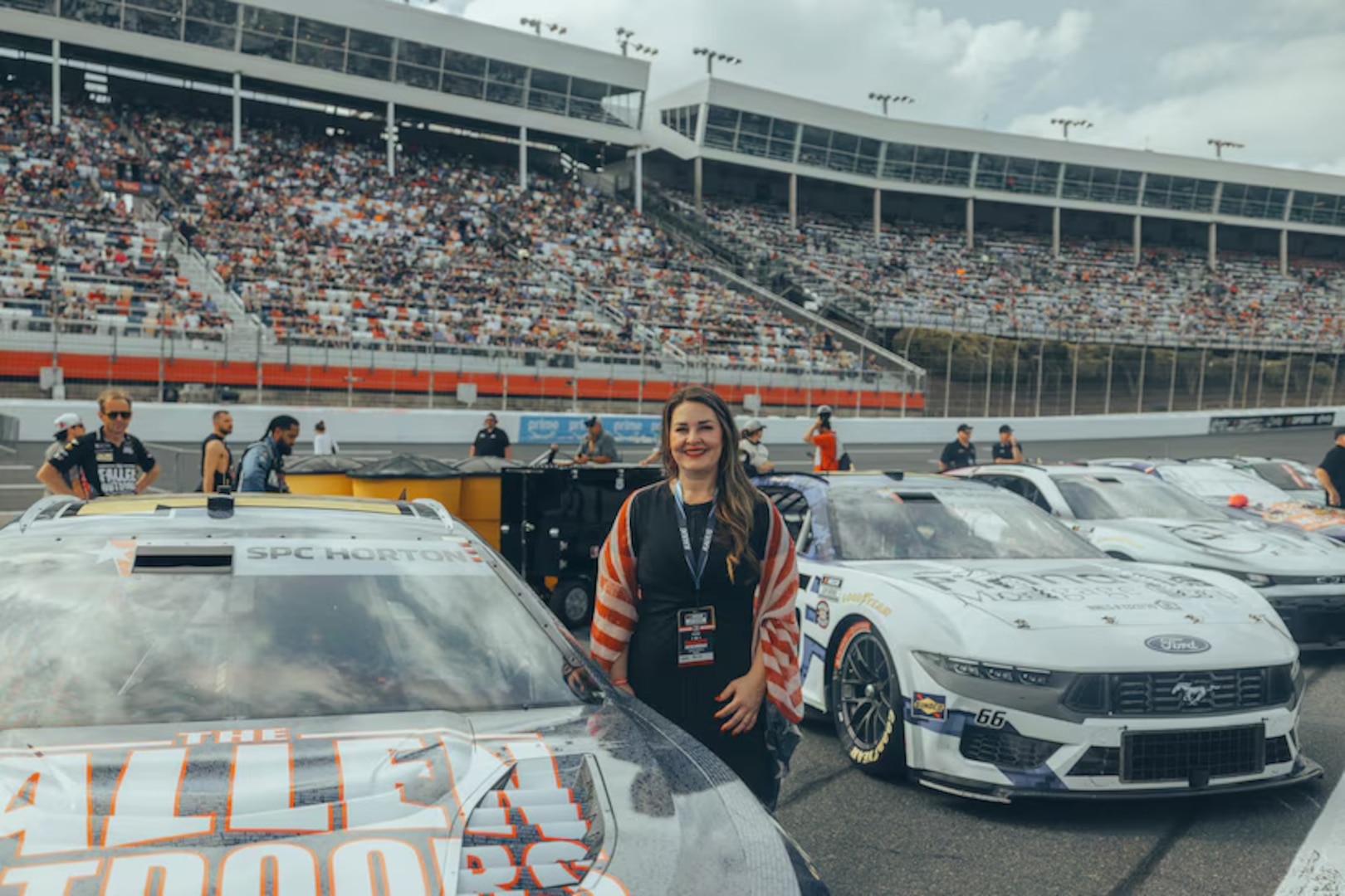 Jane Horton poses next to Ty Dillon's No. 10 Chevrolet before the Coca-Cola 600 NASCAR race at Charlotte Motor Speedway in North Carolina, May 24, 2026.
