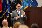 DLA Disposition Services Director Mike Cannon provides opening remarks during the Industrial Association Industry Day in Battle Creek, Michigan on May 20, 2026.
