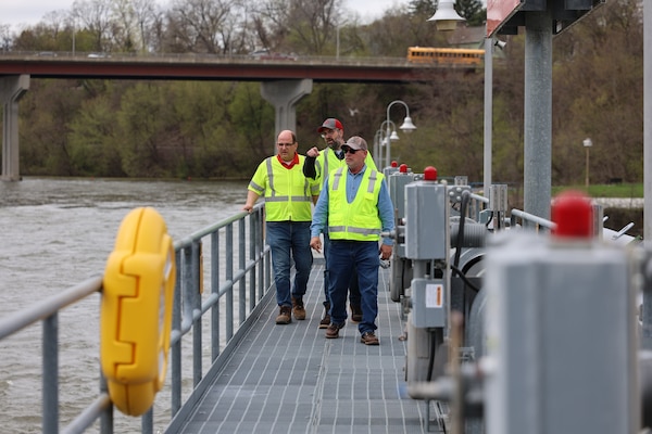 Chief of Emergency Management Bob Paluch, Acting Chief of the Operations and Regulatory Division, David Buccaro and Fox River Section Chief and Engineering Technician, Ray Frana take a look at dam operations and notate any damage or concerns during an inspection during the April flooding event in Wisconsin