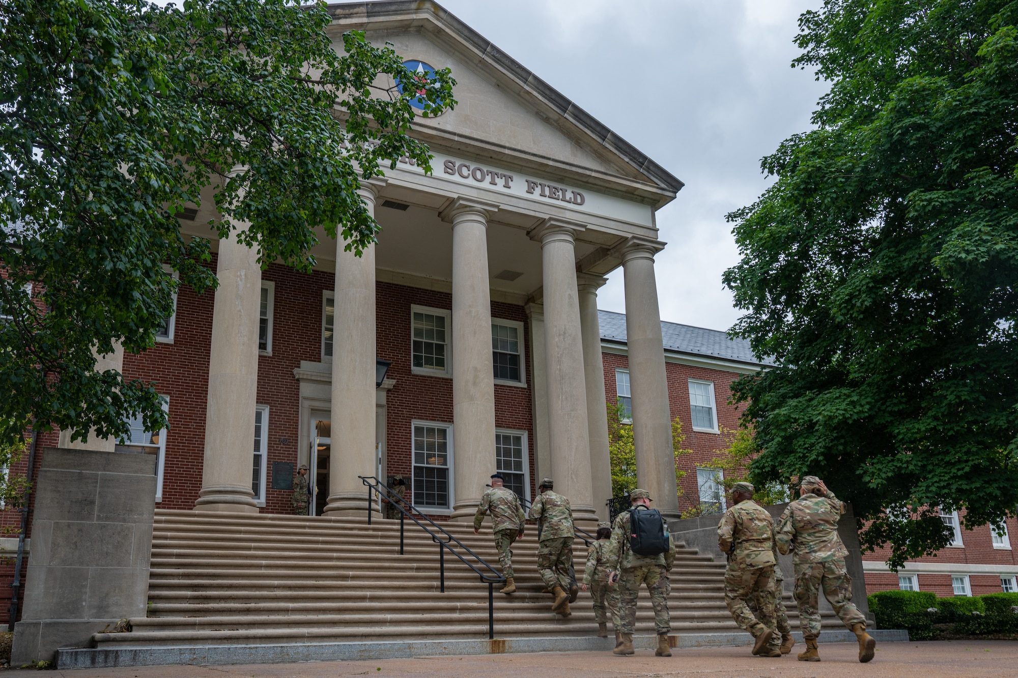 Airmen enter building