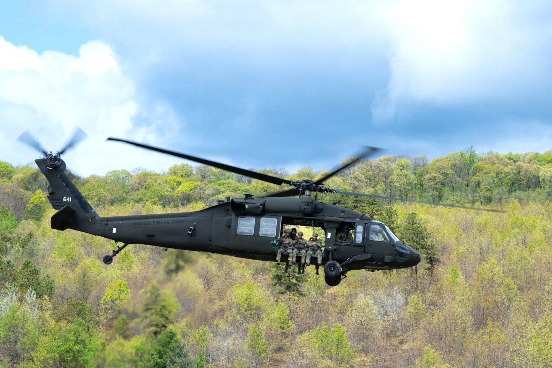 Army parachute riggers assigned to Defense Logistics Agency Distribution, Susquehanna, Pennsylvania, join airmen from the 148th Air Support Operations Squadron, a subordinate unit of the 193rd Special Operations Wing based at Fort Indiantown Gap, for a static line jump at Fort Indiantown Gap, April 30, 2026. (DOW photo by Dorie Heyer, released)