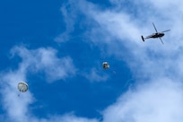 Army parachute riggers assigned to Defense Logistics Agency Distribution, Susquehanna, Pennsylvania, join airmen from the 148th Air Support Operations Squadron, a subordinate unit of the 193rd Special Operations Wing based at Fort Indiantown Gap, for a static line jump at Fort Indiantown Gap, April 30, 2026. (DOW photo by Dorie Heyer, released)