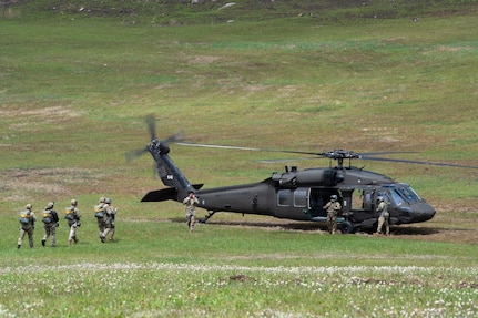 Army parachute riggers assigned to Defense Logistics Agency Distribution, Susquehanna, Pennsylvania, join airmen from the 148th Air Support Operations Squadron, a subordinate unit of the 193rd Special Operations Wing based at Fort Indiantown Gap, for a static line jump at Fort Indiantown Gap, April 30, 2026. (DOW photo by Dorie Heyer, released)
