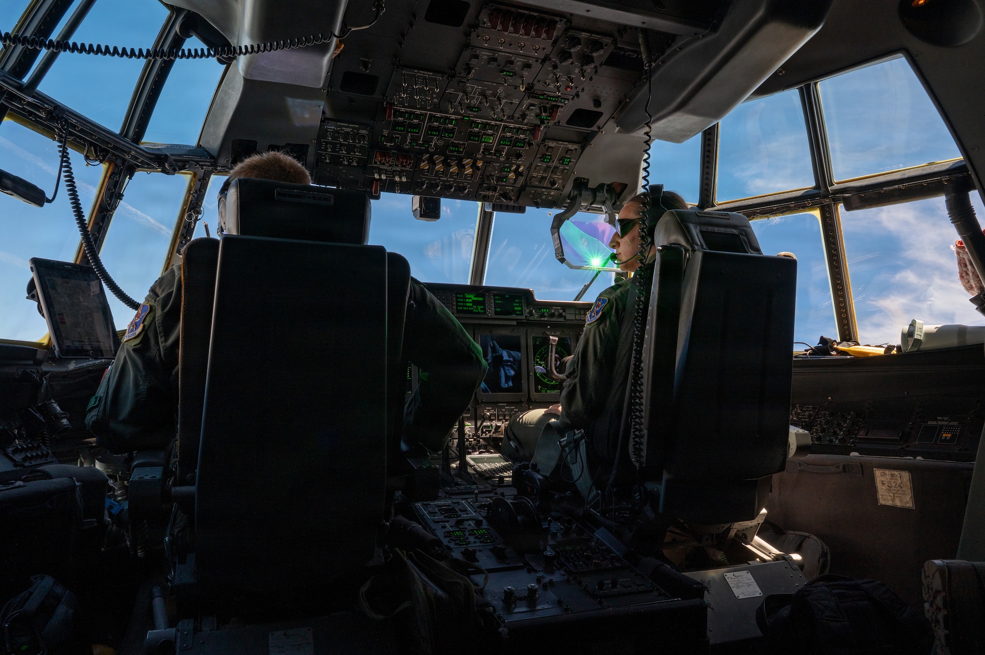 Pilots flying a HC-130J Combat King II.