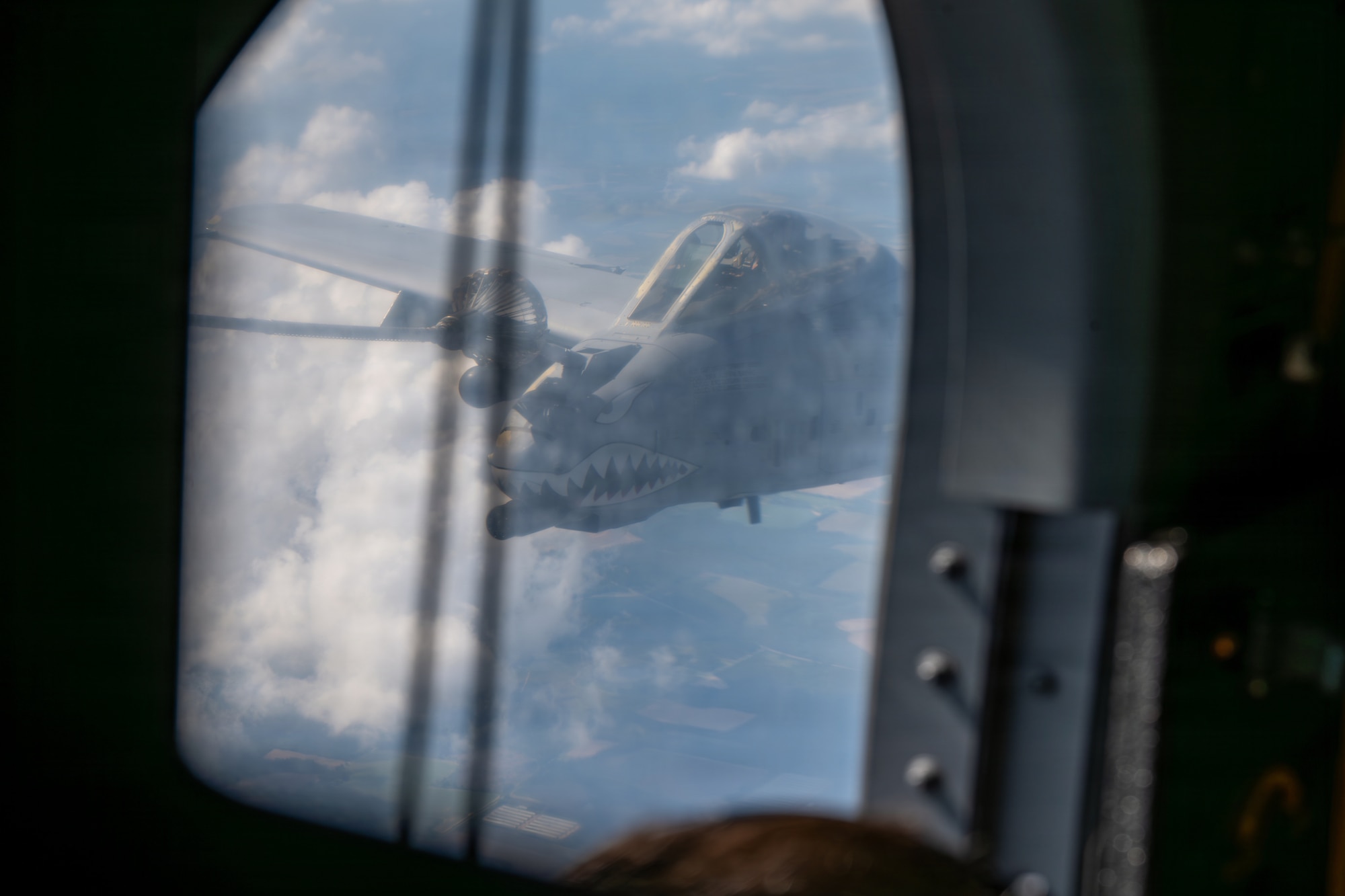 A-10C Thunderbolt flying and getting refueled.
