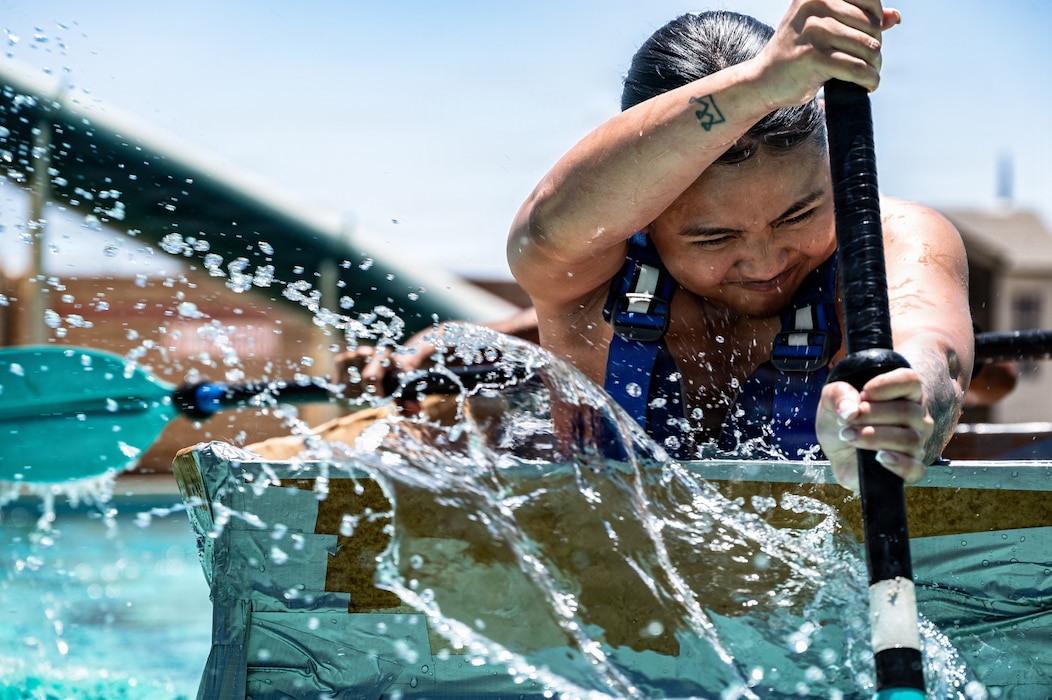 U.S. Air Force Senior Airman Mary Ramos, 56th Civil Engineer Squadron operations management journeyman, paddles toward the finish line during the annual 56th CES Boat Regatta at Luke Air Force Base, Arizona, May 20, 2026.