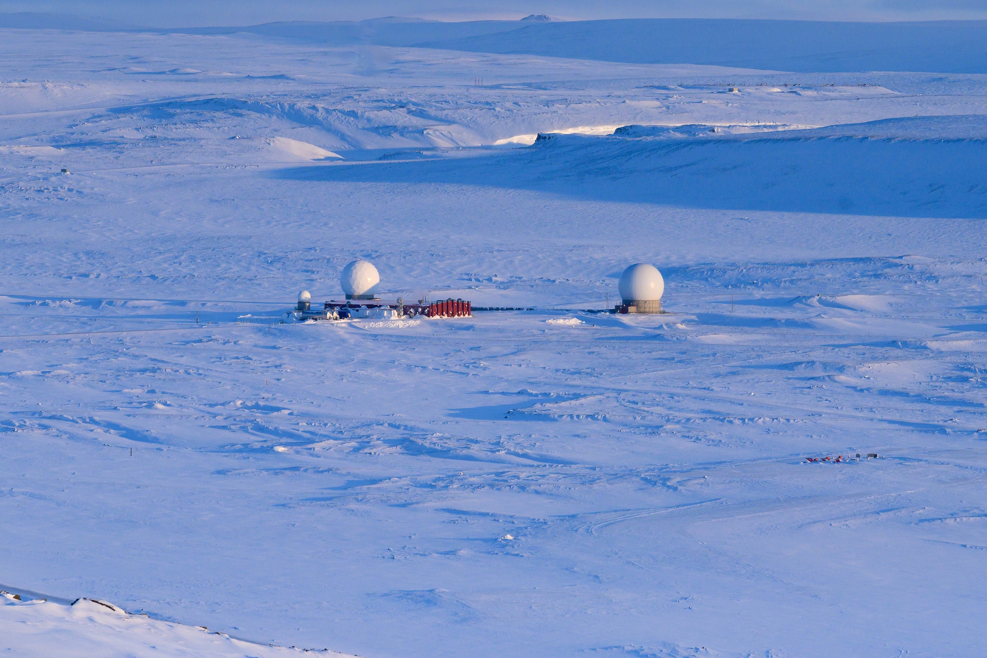 Thule Tracking Station, known as callsign POGO, operated by the 22nd Space Operations Squadron, Detachment 7, is the northernmost unit of seven worldwide tracking stations in the U.S. Space Force Satellite Control Network at Pituffik Space Base, Greenland, April. 8, 2026. A component of Mission Delta 31 - Det 7’s mission is to provide telemetry, tracking and commanding operations to the U.S. and allied government satellite programs. The detachment’s extreme northern location allows contact with polar orbiting satellites 5-12 times per day ranging in altitude from 120 miles to 24,800 miles above the earth's surface. (U.S. Space Force photo by Heather Johnson)