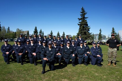 A large group of Alaska Military Youth Academy Cadets posing for a photo.