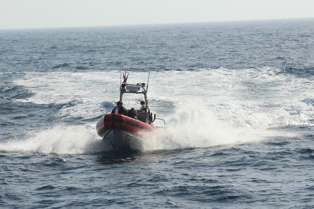 A Coast Guard boarding team assigned to the 154-foot fast response cutter USCGC John McCormick (WPC 1121) transports suspected aliens to the cutter following a vessel boarding approximately 22 miles offshore of Mission Bay in San Diego, California, May 19, 2026. During the boarding, 36 suspected aliens were identified, all claiming Mexican nationality. (U.S. Coast Guard courtesy photo)