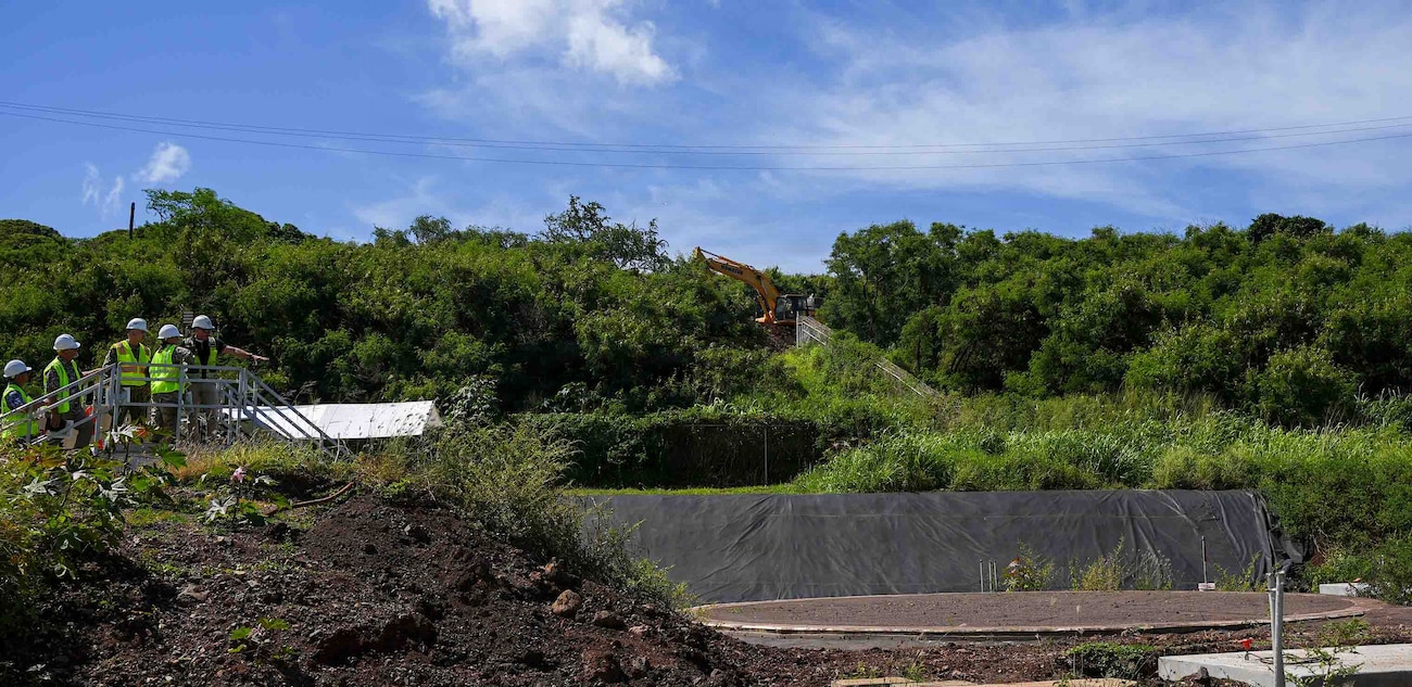 Navy Closure Task Force-Red Hill (NCTF-RH) staff and Col. Rachel Sullivan, U.S. Army Garrison Hawaii commander, inspect the foundation where a new water treatment system will be built during a site visit to the Red Hill Bulk Fuel Storage Facility (RHBFSF) in Honolulu, May 12, 2026. Charged with the safe decommissioning of the RHBFSF, NCTF-RH was established by the Department of the Navy as a commitment to the community and the environment. NCTF-RH continues to engage with the people of Hawaii, regulatory agencies, and other stakeholders as it safely and deliberately decommissions the facility. (U.S. Navy photo by Mass Communication Specialist 1st Class Glenn Slaughter)