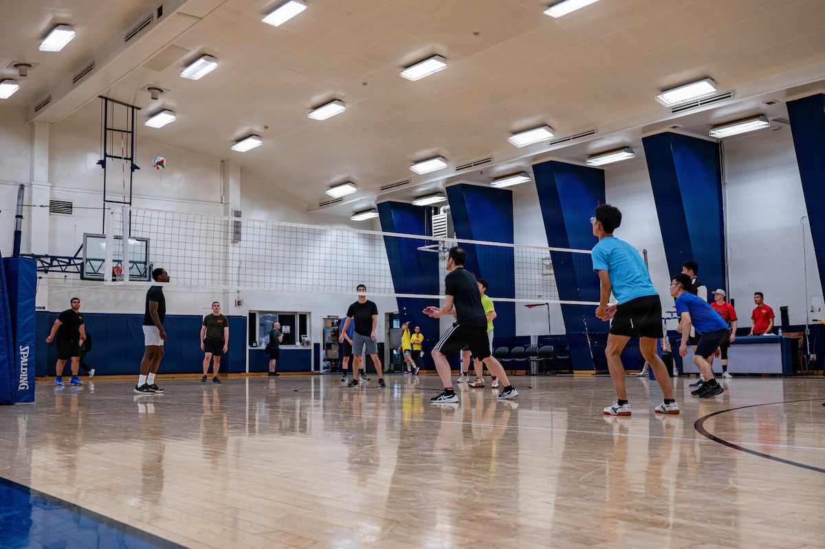 U.S. military and Japan Air Self-Defense Force players compete in a volleyball match during the 2026 Sakura Olympics at Misawa Air Base, Japan, May 13, 2026. The annual event promotes teamwork, communication and camaraderie by bringing together members of the Misawa community through friendly athletic competition. (U.S. Air Force photo by Airman 1st Class Angelica Winther)