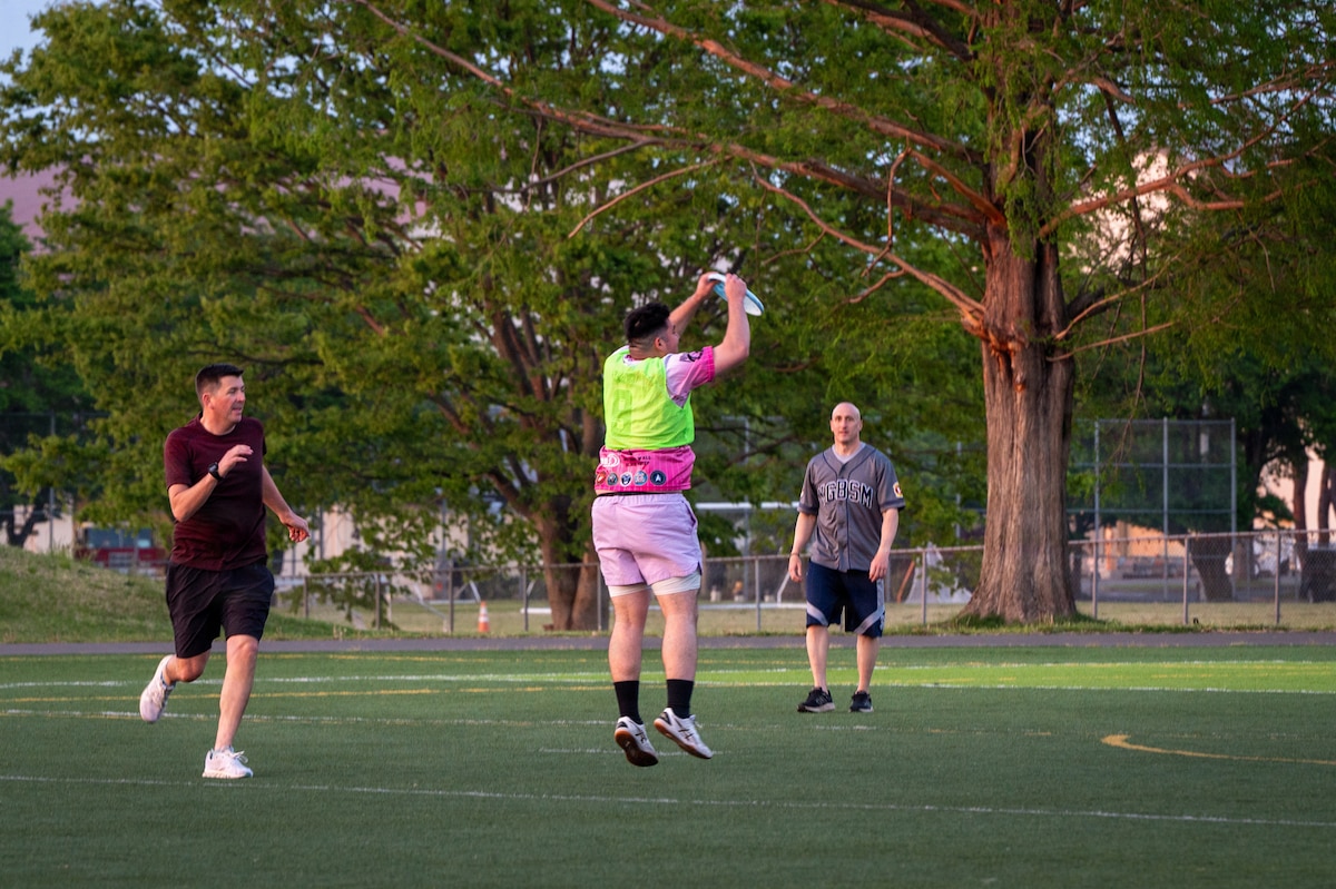 A participant catches a frisbee during an ultimate frisbee match as part of the 2026 Sakura Olympics at Misawa Air Base, Japan, May 13, 2026. The annual event promotes teamwork, sportsmanship and community involvement by bringing together members of the Misawa community through friendly competition. (U.S. Air Force photo by Airman 1st Class Angelica Winther)