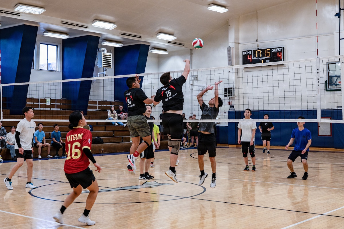 U.S. military and Japan Air Self-Defense Force participants compete in a volleyball match at the 2026 Sakura Olympics at Misawa Air Base, Japan, May 13, 2026. The annual event reflects the spirit of collaboration and mutual respect as U.S. Forces and Japan Air Self-Defense Force members come together to build camaraderie and strengthen partnerships through sports competition. (U.S. Air Force photo by Airman 1st Class Angelica Winther)