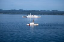U.S. Coast Guard Cutter Osprey (WPB-87307) and Japan Coast Guard ship Itsukushima transit the Strait of Juan de Fuca during a joint search and rescue exercise, May 21, 2026.