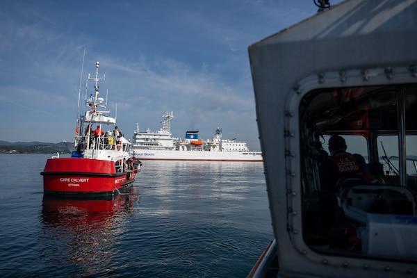 Canadian Coast Guard Motor Lifeboat Cape Calvert and a U.S. Coast Guard Station Port Angeles 45-foot Response Boat Medium approach Japan Coast Guard ship Itsukushima during a joint search and rescue exercise in the Strait of Juan de Fuca, May 21, 2026.