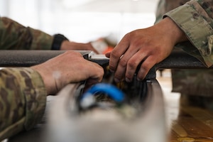 U.S. Army Staff Sgt. Nicholas Davis and Spc. Octavio Landeros, both with the Field Artillery Squadron, 2d Cavalry Regiment, secure the wings of a one-way attack Hornet drone in preparation for flight operations at Bemowo Piskie Training Area, Poland, May 3, 2026. From April 27 to May 31, 2026, U.S. and Allied forces will exercise NATO’s Eastern Flank Deterrence Initiative, demonstrating NATO’s ability to fight and win on the modern battlefield. Nearly 15,000 troops from eleven nations will train across the High North, Baltic region, and Poland, executing rapid maneuvers, air defense, counter-drone operations, and cyber defense to validate NATO’s regional defense plans in real time. This series of linked exercises, including Saber Strike, Immediate Response, and Swift Response, turns investment into capability. Soldiers integrate unmanned systems, AI-enabled command and control, and live data networks to move faster, decide faster, and fight more effectively across all domains. Sword 26 demonstrates how U.S. Army Europe and Africa drives transformation at scale while strengthening deterrence. Together with our Allies, we are building a unified, lethal force ready to defend NATO territory and respond to any threat. (U.S. Army Reserve photo by Capt. Katherine Bustos)
