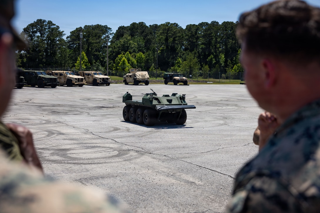 A U.S. Marine Corps Mission Master SP unmanned ground vehicle is test driven during a UGV demonstration at Marine Corps Base Camp Lejeune, North Carolina, May 18, 2026. Combat Logistics Battalion 2, 2nd Marine Logistics Group is field testing Marine Corps Warfighting Laboratory funded experimental capabilities to provide feedback on design changes and operational stability. (U.S. Marine Corps photo by Sgt. Rafael Brambila-Pelayo)