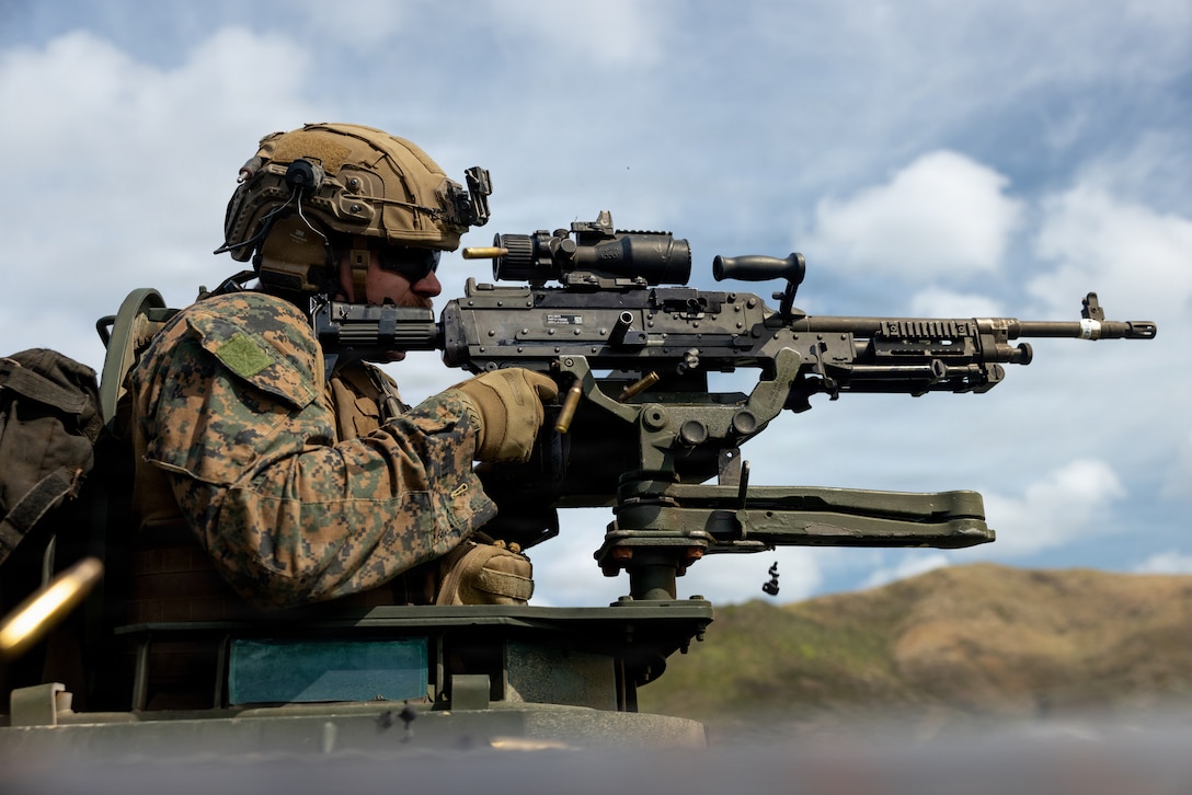 A U.S. Marine with 2nd Light Armored Reconnaissance Company, Battalion Landing Team 3/6, 22nd Marine Expeditionary Unit (Special Operations Capable), fires an M240B machine gun, mounted from a Light Armored Vehicle during a live-fire range on Camp Santiago, Puerto Rico, May 1, 2026. U.S. military forces are deployed to the Caribbean in support of the U.S. Southern Command mission, Department of War-directed operations, and the president’s priorities to disrupt illicit drug trafficking and protect the homeland. (U.S. Marine Corps photo)