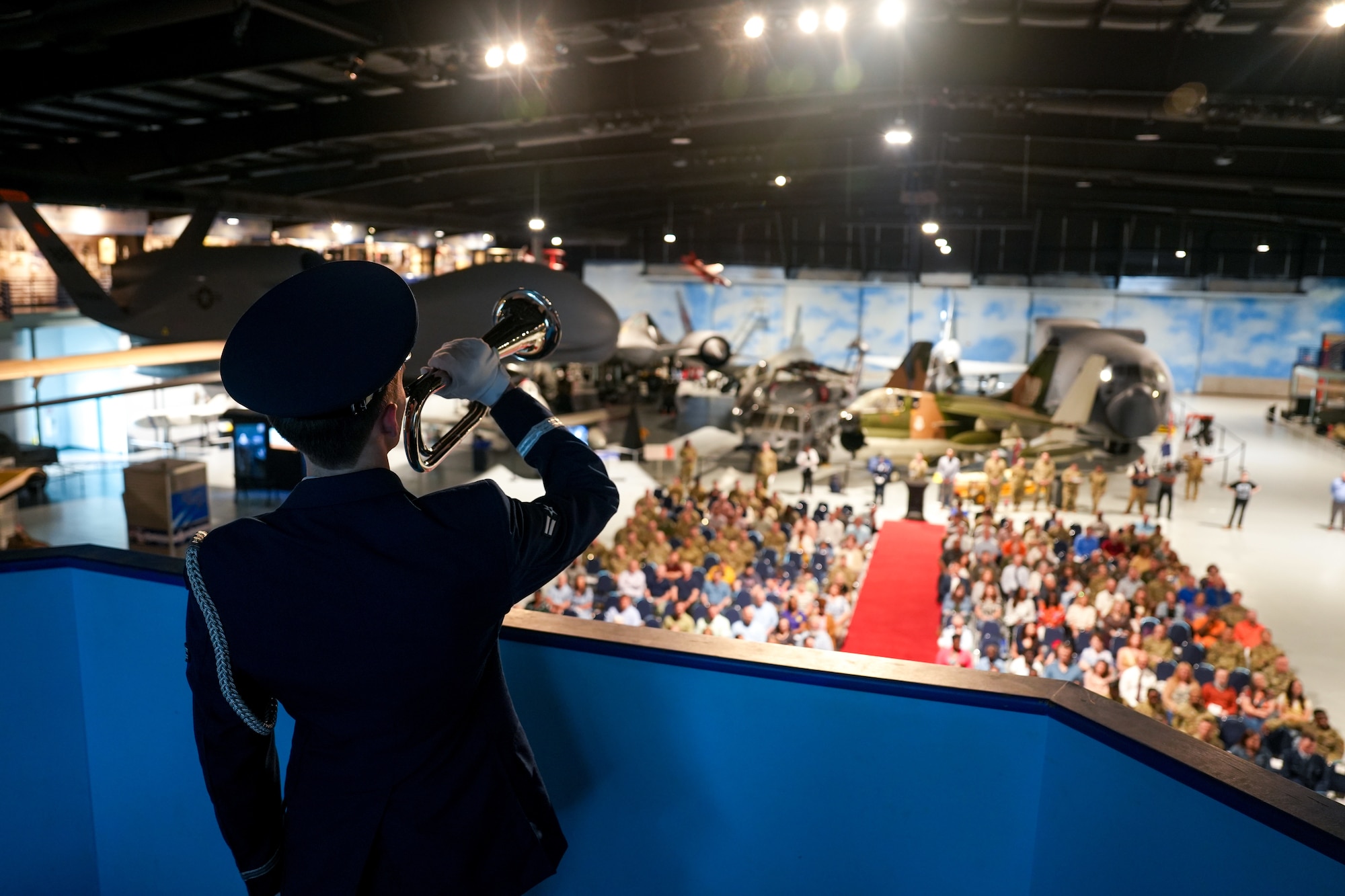 Military Honor Guard member plays “Taps”