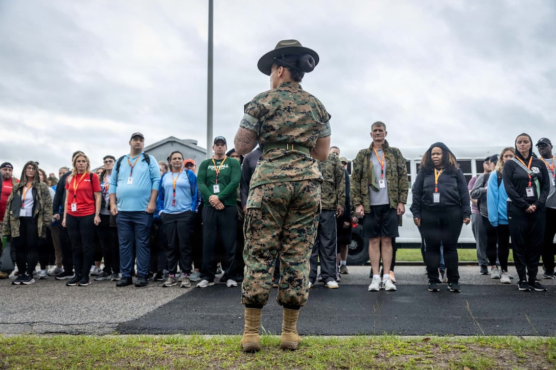 Educators with Recruiting Station Ohio and Lansing, 4th Marine Corps District, receive instructions from drill instructors during Educators Workshop at Marine Corps Recruit Depot Parris Island, South Carolina, May 13, 2026. Educators workshop provides an opportunity for high school teachers and school administrators to experience and gain insight into some of the challenges recruits face during Marine Corps recruit training. Attendees of the workshop can inform their students about the benefits and opportunities the Marine Corps can provide. (U.S. Marine Corps photo by Cpl. Hunter Jones)