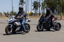 U.S. Marine Corps Gunnery Sgt. Michael King, left, the motorcycle mentorship program president for Headquarters Support Battalion Camp Pendleton, and Staff Sgt. Miles Jones, the motorcycle mentorship program president for Headquarters and Headquarters Squadron Marine Corps Air Station Camp Pendleton, prepare to conduct drills in a motorcycle riding scenario during a two-day Motorcycle Safety Foundation Instructor course at MCAS Miramar, San Diego, California, April 24, 2026. The MSF Instructor course certifies individuals to teach the Basic Riders and Advanced Riders courses, which are essential to build discipline, sharpen awareness, and set the foundation for safe riding. (U.S. Marine Corps photo by Lance Cpl. Zoey Williams)
