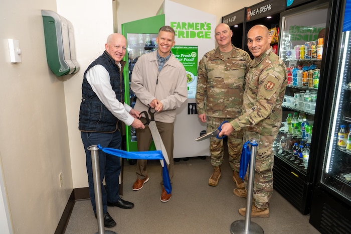 Image of people at ribbon cutting.