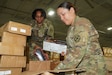 U.S. Army Reserve Spc. Melissa Rosales, right, and Pfc. Jeramaya Wilson, both automated logistical specialists assigned to the St. Charles, Mo., based 332nd Medical Company (Logistics), store medical equipment during the pre-check inventory packing, or PCIP, with the Theater Lead Agent for Medical Materiel, or TLAMM, warehouse, at Kelly Field in San Antonio, May 7, 2026. PCIPs with the TLAMM ensure individual and collective unit readiness by having Soldiers accurately pinpoint logistical requirements prior to training exercises and real-world operations. (U.S. Army Reserve photo by Sgt. 1st Class Christopher A. Hernandez)