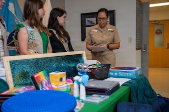 PORTSMOUTH, Va. (May 19, 2026) Girl Scout Troop 29 present Naval Medical Center Portsmouth Neurodevelopmental Pediatrics Division with a gift of sensory objects  to help improve patient outcomes at NMCP, May 21, 2026. Navy Medicine Readiness and Training Command (NMRTC) Portsmouth is the premier readiness and training platform that provides superior medical training for military medical service members at NMCP, the U.S. military’s oldest, continuously operating military hospital since 1830. (U.S. Navy photo by Mass Communication Specialist 2nd Class Thomas Boatright)