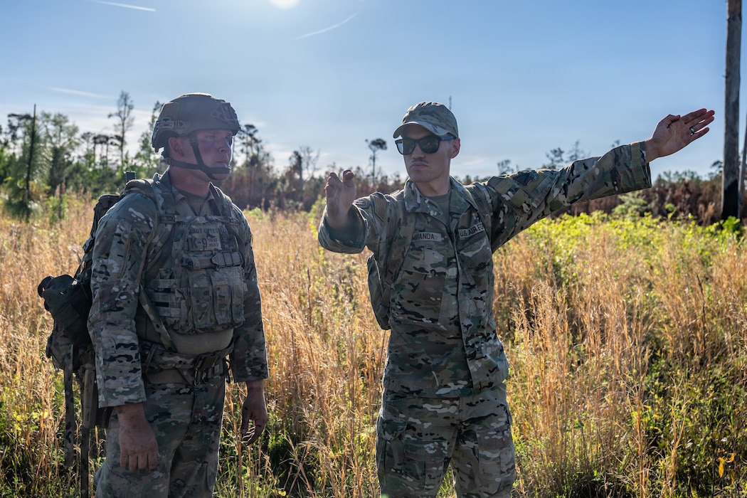 A U.S. Air Force military working dog assigned to the 820th Base Defense Group search for simulated isolated personnel during a survival, evasion, resistance and escape (SERE) training exercise at Moody Air Force Base.