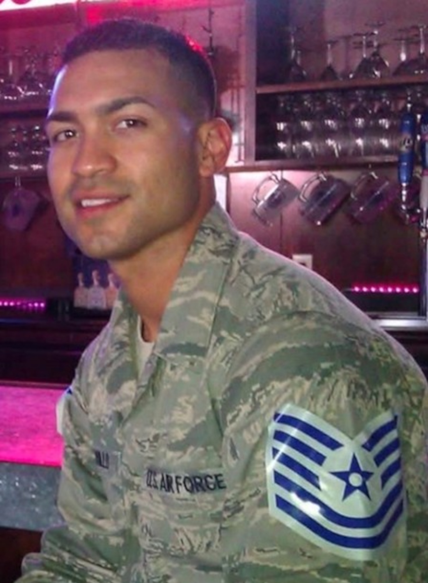 Tech. Sgt. select Joseph Carrillo, diet therapy specialist, poses for a photo while celebrating his promotion to Tech. Sgt. in 2011 at Travis Air Force Base, Calif. Carrillo credits this night as one of his proudest moments as he made Tech. Sgt. in under 10 years, a challenge his best friend who he later loss, Tech. Sgt. Fernandez, gave him. (Courtesy photo)