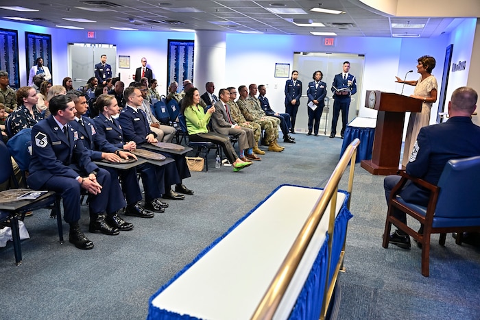 Janine Sijan speaks during an award ceremony at the Pentagon in Arlington, Va., May 26, 2026. Master Sgt. Steven Nelson, Chief Master Sgt. William Brakebill, Capt. Megan Langas and Maj. Joe Goliber were presented the Lance P. Sijan Award for leadership. (U.S. Air Force photo by Eric Dietrich)