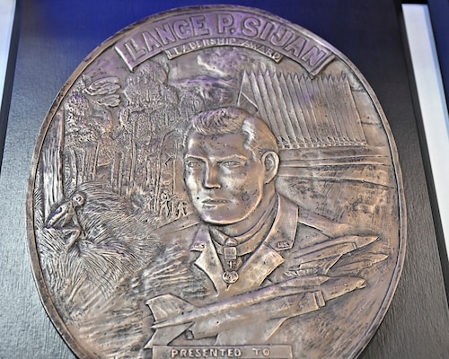 The Lance P. Sijan Award for leadership is displayed during a ceremony at the Pentagon in Arlington, Va., May 26, 2026. The recipients were Master Sgt. Steven Nelson, Chief Master Sgt. William Brakebill, Capt. Megan Langas and Maj. Joe Goliber. (U.S. Air Force photo by Eric Dietrich)